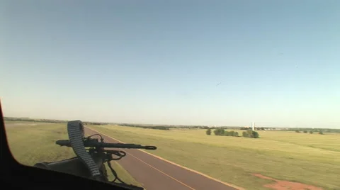 Huey gunship shadow taking off Stock Footage 41063376
