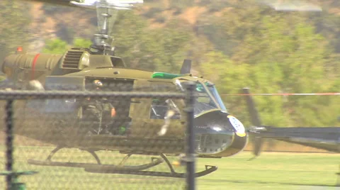 Huey Helicopter flying low Stock Footage 2910344