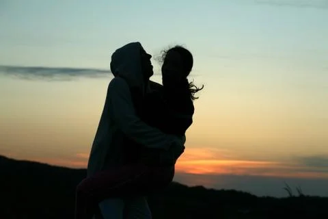 Hug sunset Stock Photos