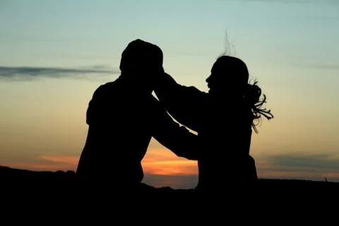 Hug sunset Stock Photos