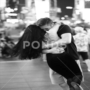 A Hug In Times Square Stock Photos