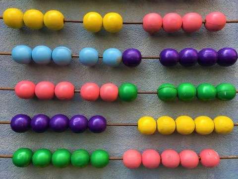 A huge abacus on a wall. Stock-Fotos