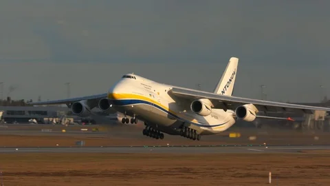 Huge airplane antonov 124 take off slow motion Stock Footage