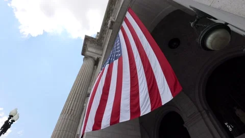 Huge American Flag in front of Union Station in Washington DC Stock Footage