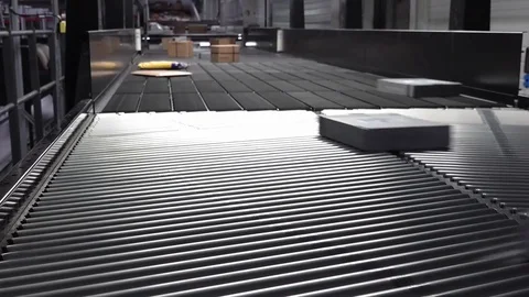 Huge amount of parcels bein transported on conveyor belts Stock Footage 83637803