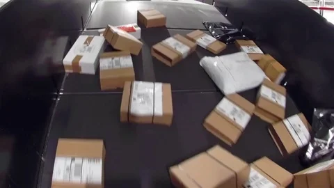 Huge amount of parcels bein transported on conveyor belts - time lapse Stock Footage 83688793