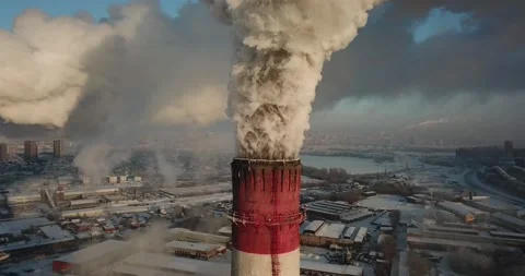 A huge amount of smoke comes out of the Industrial chimney Stock Footage 146112161