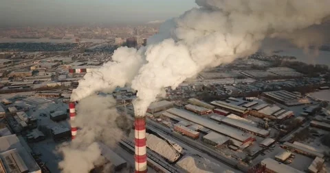 A huge amount of smoke comes out of the Industrial chimney Stock Footage 146112197