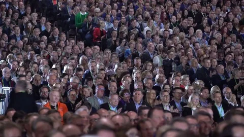 Huge audience listens to the speaker. Stock Footage 80919564