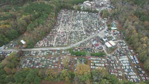 Huge auto salvage yard surrounded by forest Virginia aerial orbit 스톡 동영상 347442798