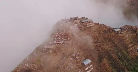 Huge Batur volcano peak surrounded by clouds Video stock 124607792