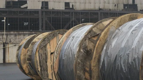 Huge Bay with a cable in the cable factory yard waiting for loading to transport Stock Footage 119479606