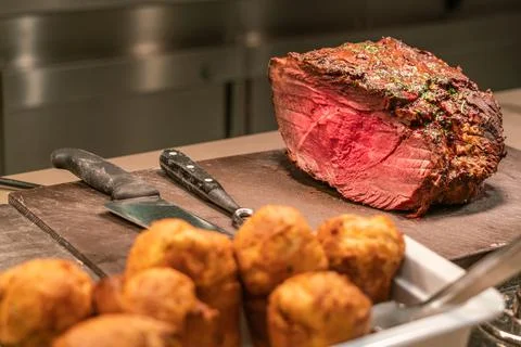Huge BBQ Beef Steak in the kitchen background Stock Photos
