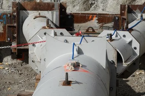 Huge bifurcating pipe at a construction site underground Stock Photos