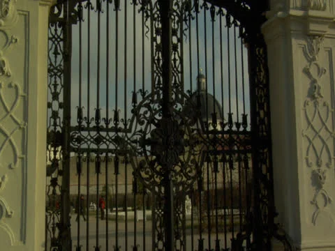 The huge Black gate with modular design supported by walls Stock Footage 22748646