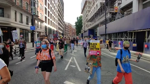 HUGE BLM CROWDS CHANT 'THE UK IS NOT INNOCENT' AT LONDON RALLY, 4K Stock Footage 133204784