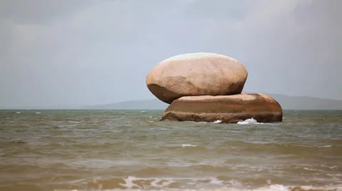 Huge Bolder on a Rock in the Ocean Stock Footage 33193360