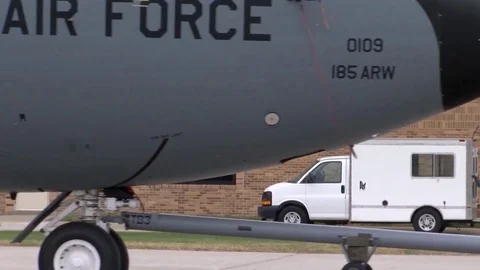 Huge Bomber pulled along runway Stock Footage 120730912