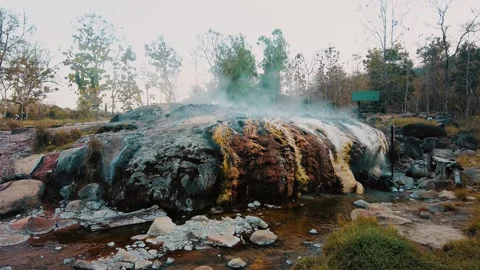 Huge boulder in hotspring boiling water source muang rae hotspring in pai Stock-Footage 341995699