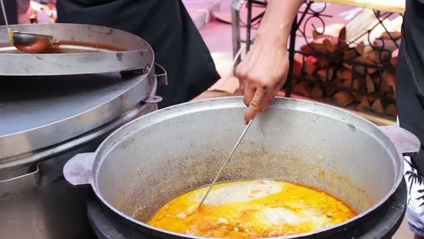 A huge bowl of hot soup, which is poured for peopleStreet Food, Fast Food, Snack Stock Footage