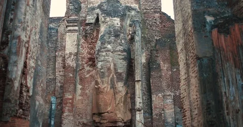 A huge brick Buddha statue in an ancient collapsed temple Stock Footage 85392390