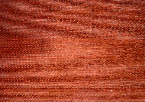 Huge brick wall background Stock Photos