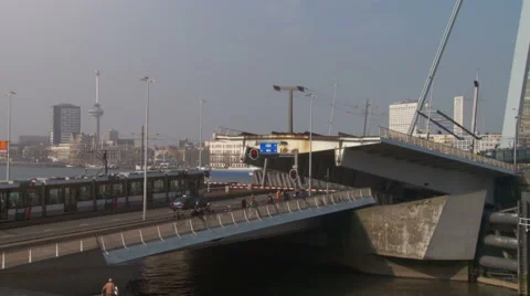 Huge bridge opens for passing boats, Erasmusbrug in Rotterdam, The Netherlands Stock Footage 42491470