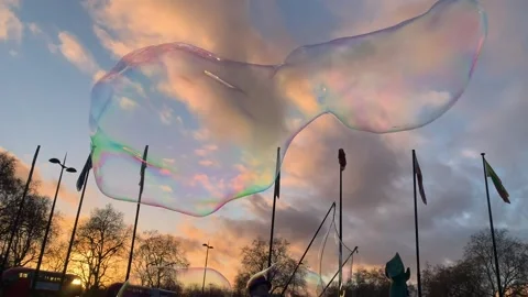 Huge bubble in the sky at sunset Marble Arch London Stock Footage 145399712