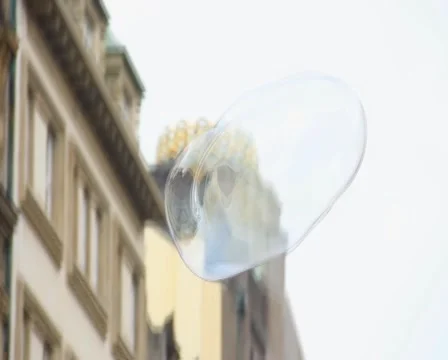 Huge bubble of soap flying in the air, burst high, click for HD Stock Footage 43895804