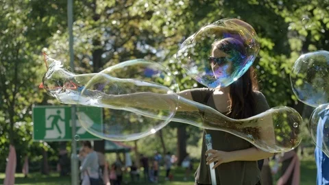Huge Bubbles in the Forest Stock Footage 108685243