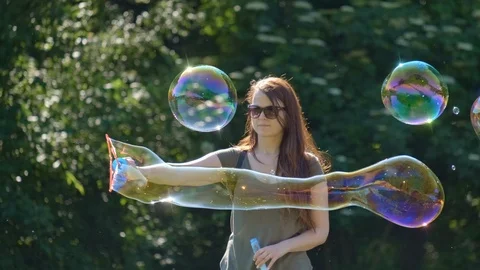 Huge Bubbles in the Forest Stock Footage 108685411