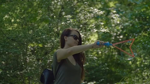 Huge Bubbles in the Forest Stock Footage 108685698