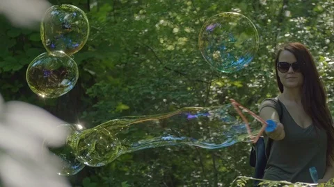 Huge Bubbles in the Forest Stock Footage 108685861