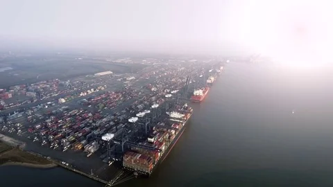 Huge Busy Port Unloading Container Ships, Aerial View Video stock 83725886