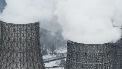 Huge chimneys of thermal station polluting atmosphere. Drone aerial view Stock Footage 219639940