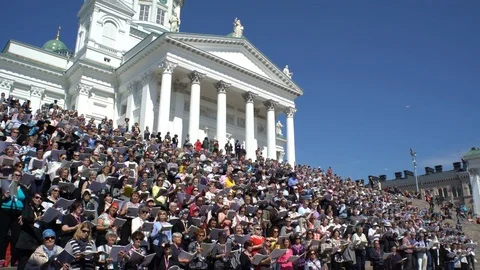 Huge choir singing on the steps of the Cathedral, Helsinki Stock Footage 75872602