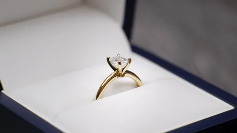 Huge classic diamond ring being opened from velvet box. Fingers lifting ring Stock Footage 341561764
