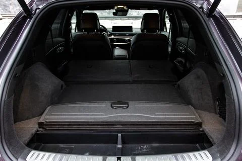 Huge, clean and empty car trunk in interior of compact suv. Rear view of a SU Stock Photos