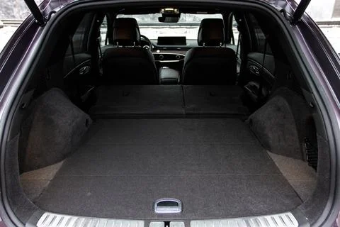 Huge, clean and empty car trunk in interior of compact suv. Rear view of a SU Stock Photos