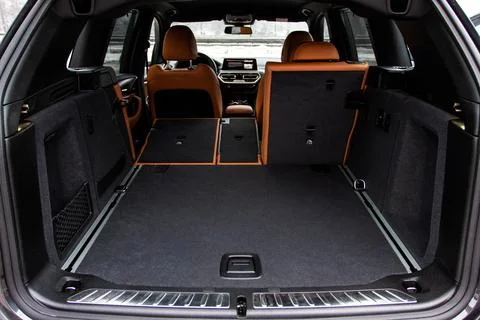 Huge, clean and empty car trunk in interior of compact suv. Rear view of a SU Stock Photos