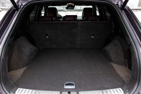 Huge, clean and empty car trunk in interior of compact suv. Rear view of a SU Stock Photos