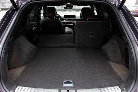 Huge, clean and empty car trunk in interior of compact suv. Rear view of a SU Stock Photos
