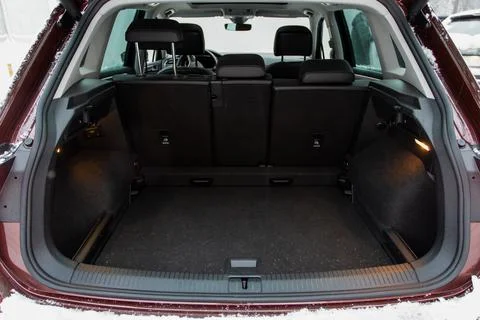 Huge, clean and empty car trunk in interior of compact suv. Rear view of a SU Stock Photos
