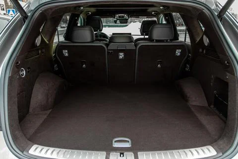 Huge, clean and empty car trunk in interior of compact suv. Rear view of a SU Stock Photos