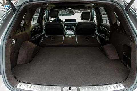 Huge, clean and empty car trunk in interior of compact suv. Rear view of a SU Stock Photos