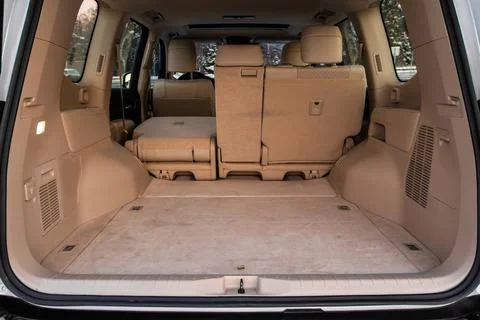 Huge, clean and empty car trunk in interior of compact suv. Rear view of a SU Stock Photos