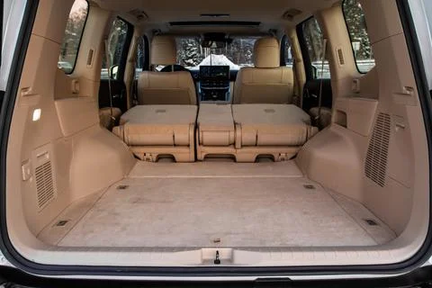 Huge, clean and empty car trunk in interior of compact suv. Rear view of a SU Stock Photos