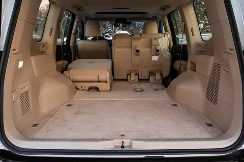 Huge, clean and empty car trunk in interior of compact suv. Rear view of a SU Stock Photos