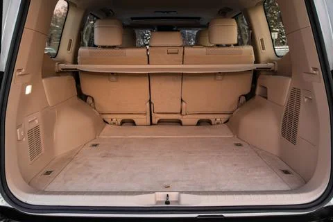 Huge, clean and empty car trunk in interior of compact suv. Rear view of a SU Stock Photos