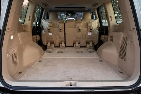 Huge, clean and empty car trunk in interior of compact suv. Rear view of a SU Foto stock